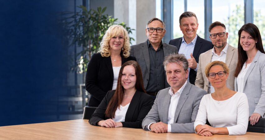 Das Team von Kämmer Consulting gemeinsam im Büro
