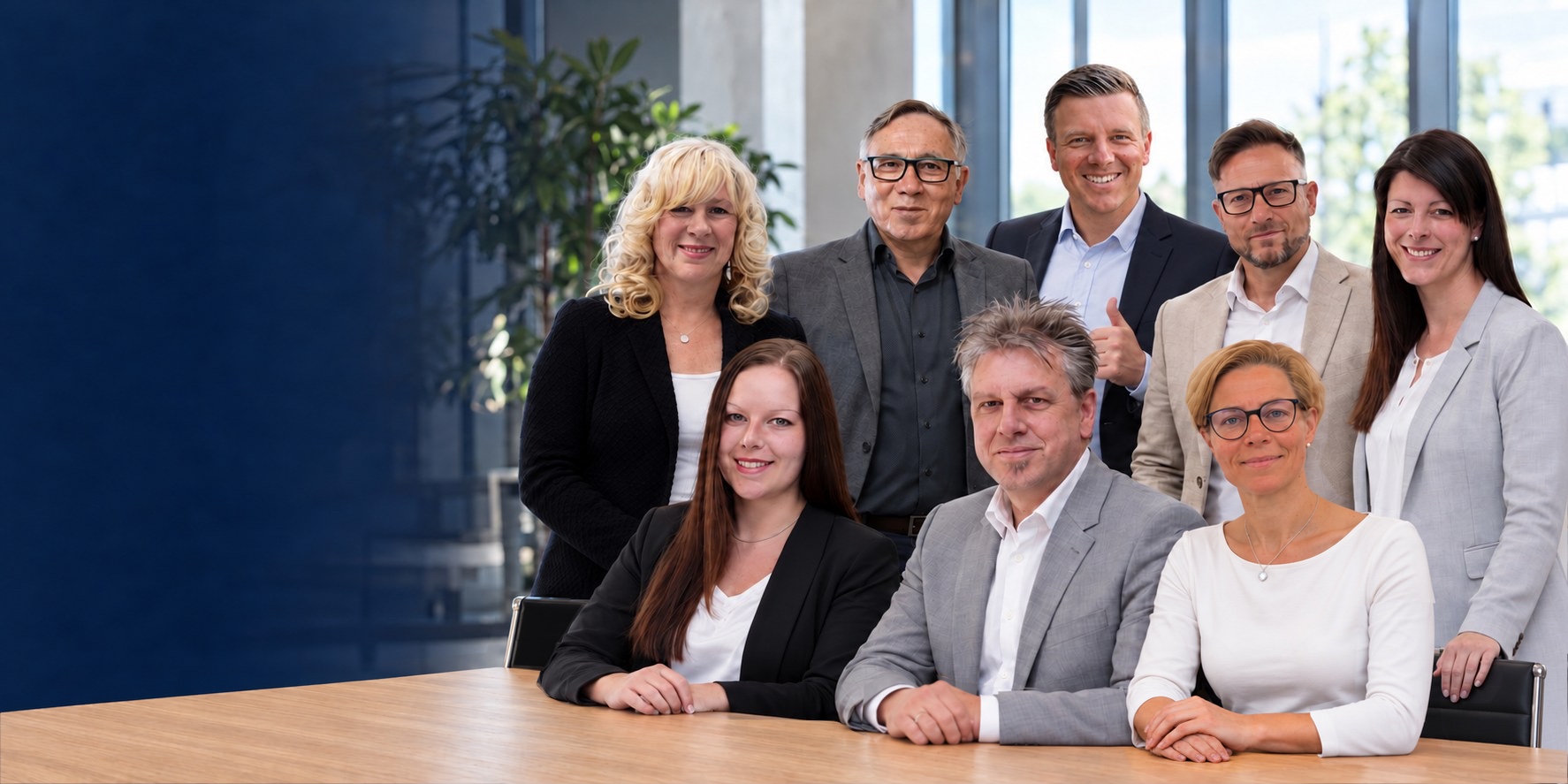 Das Team von Kämmer Consulting gemeinsam im Büro